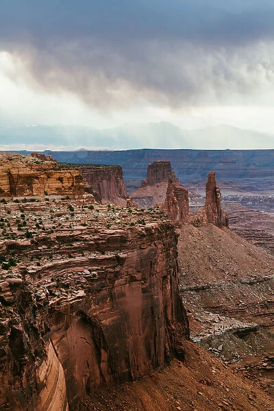 Dramatic clouds over valley, Canyonlands, Utah, USA