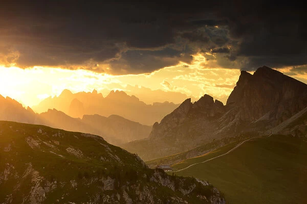 Dramatic sunset over Passo Giau, Dolomites