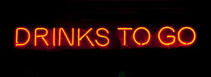 Framed Print : Drinks to go neon sign on a black background Framed Print : Drinks to go neon sign on a black background