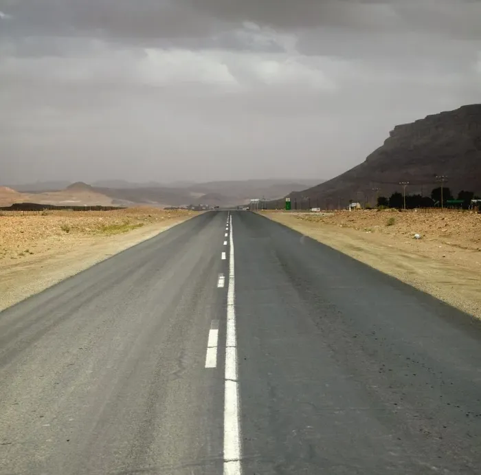 Framed Print : Dual Tar Road Going Through Arid Area on an Overcast Day Framed Print : Dual Tar Road Going Through Arid Area on an Overcast Day