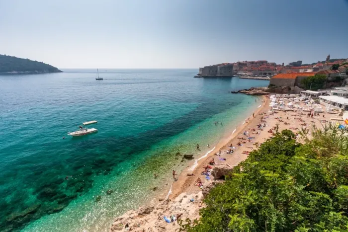 Framed Print : Dubrovnik, Croatia. Beach view with city in background Framed Print : Dubrovnik, Croatia. Beach view with city in background