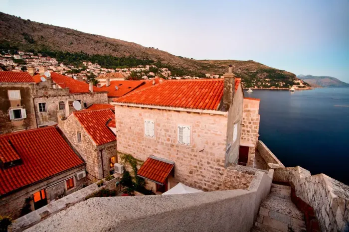 Framed Print : Jewel. Dubrovnik homes on city walls have an incredible over Adriatic Framed Print : Jewel. Dubrovnik homes on city walls have an incredible over Adriatic
