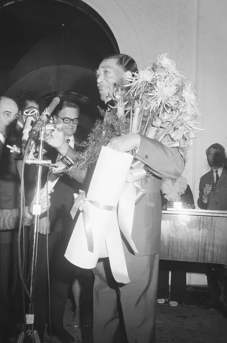Framed Print : Duke Ellington Holding Large Bouquet at Music Award Ceremonies