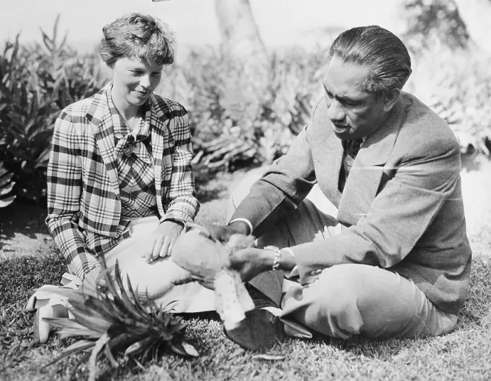 Framed Print : Duke Kahanamoku Eating Pineapple with Amelia Earhart Framed Print : Duke Kahanamoku Eating Pineapple with Amelia Earhart