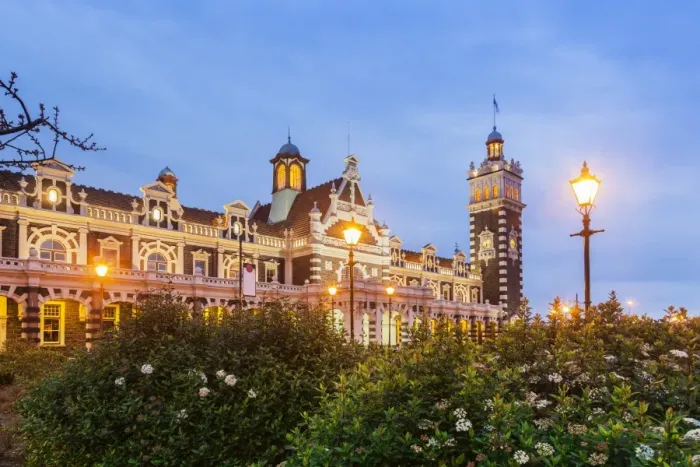Framed Print : Dunedin Railway Station, illuminated at twilight, Otago, South Island, New Zealand Framed Print : Dunedin Railway Station, illuminated at twilight, Otago, South Island, New Zealand