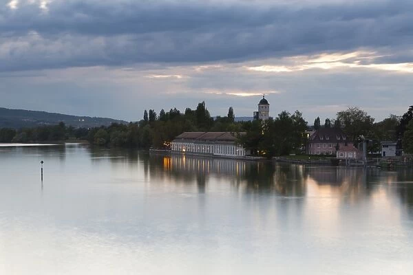 Dusk at the Seerhein or Lake Rhine River, with the old water tower and the Bleiche building, Stromeyersdorf, Konstanz, Baden-Wurttemberg, Germany