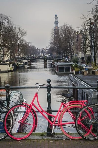 A Dutch Bicycle Parked on an Amsterdam Canal Bridge