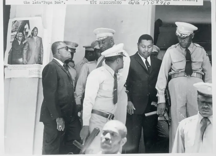 Framed Print : Duvalier Escorted by Military