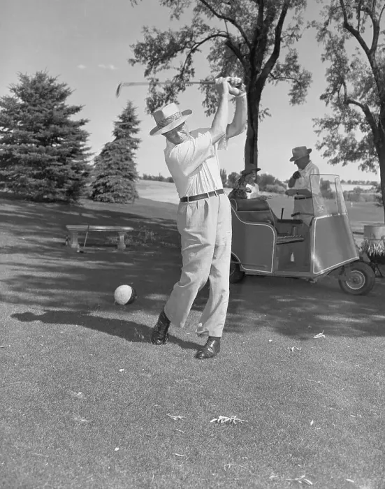 Framed Print : Dwight D. Eisenhower Swinging Golf Club