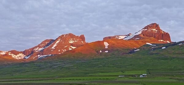 Dyrfjoell massif in the morning light, Bakkageroi, Iceland, Europe