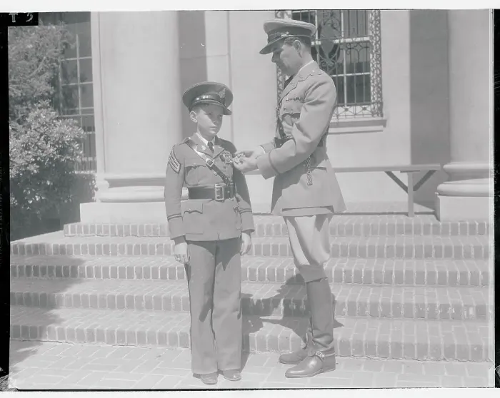 Framed Print : Earl Foxe Observing Medal on Young Cadet Framed Print : Earl Foxe Observing Medal on Young Cadet