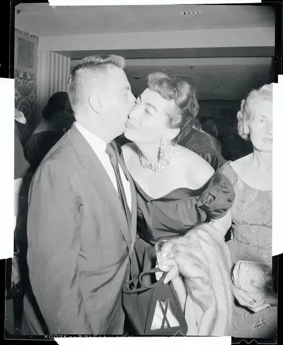 Framed Print : Earl Wilson Kissing Joan Crawford Framed Print : Earl Wilson Kissing Joan Crawford