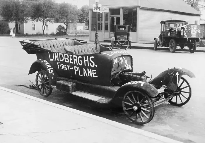 Framed Print : Early Model Car Parked at Station