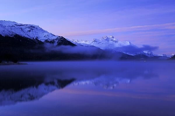 Early morning on Lake Silvaplana, Mt Piz da la Margna at back, St. Moritz, Engadine, Grisons, Switzerland, Europe