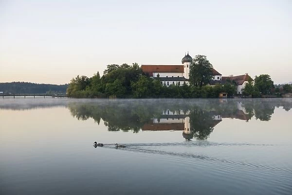 Early morning at Seeon Abbey on an island in Seeoner See Lake, Seeon-Seebruck, Chiemgau, Upper Bavaria, Bavaria, Germany