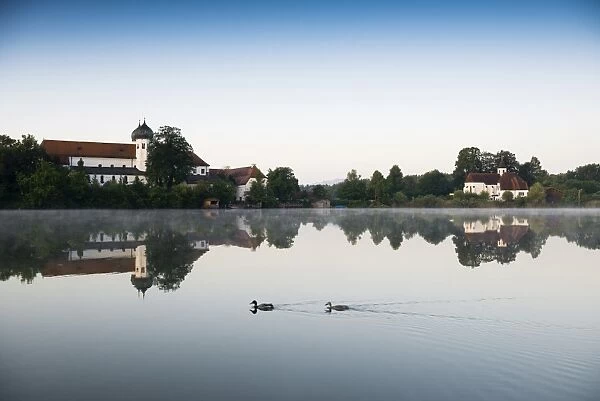 Early morning at Seeon Abbey on an island in Seeoner See Lake, Seeon-Seebruck, Chiemgau, Upper Bavaria, Bavaria, Germany