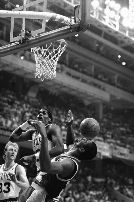 Framed Print : Earvin Johnson Taking Hit from Basketball Framed Print : Earvin Johnson Taking Hit from Basketball