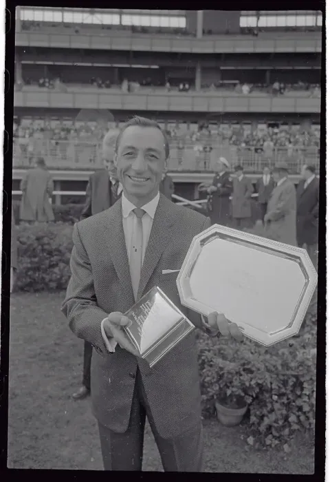 Framed Print : Eddie Arcaro Holding Silver Trophies Framed Print : Eddie Arcaro Holding Silver Trophies