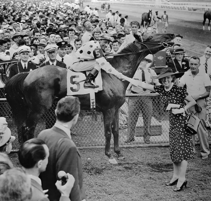 Framed Print : Eddie Arcaro on Nashua in Winners Circle with Crowd Behind Framed Print : Eddie Arcaro on Nashua in Winners Circle with Crowd Behind