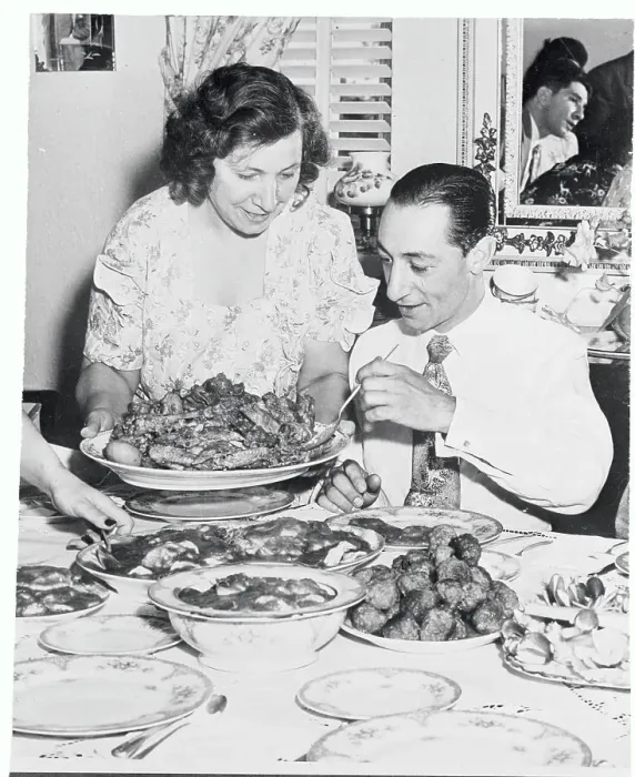 Framed Print : Eddie Arcaro Being Served Food by His Mother Framed Print : Eddie Arcaro Being Served Food by His Mother