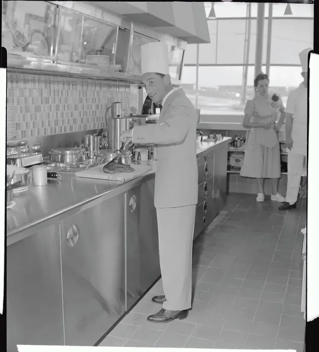 Framed Print : Eddie Arcaro Wearing Chef Hat While Cooking Framed Print : Eddie Arcaro Wearing Chef Hat While Cooking