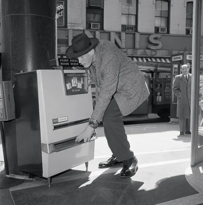 Framed Print : Eddie Carmel Using a Cigarette Machine Framed Print : Eddie Carmel Using a Cigarette Machine