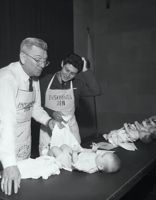 Framed Print : Eddie Fisher and Hershey Lewis Changing Diapers