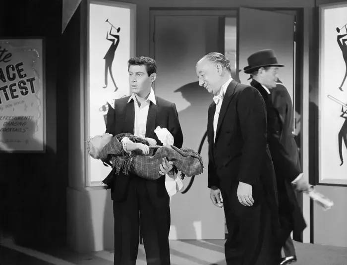 Framed Print : Eddie Fisher Holding a Baby Framed Print : Eddie Fisher Holding a Baby
