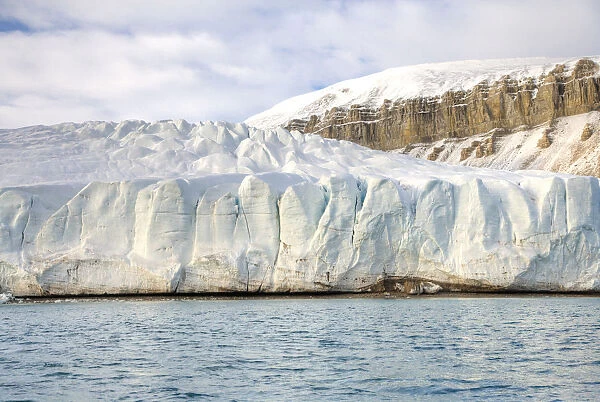 Edge of a glacier along a shoreline