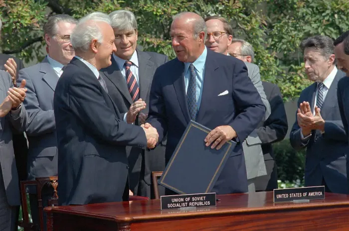 Framed Print : Eduard Shevardnadze and George Shultz Shaking Hands Framed Print : Eduard Shevardnadze and George Shultz Shaking Hands