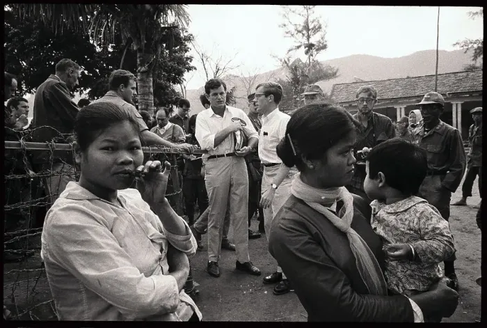 Framed Print : Edward Kennedy Behind Women in Vietnam Framed Print : Edward Kennedy Behind Women in Vietnam