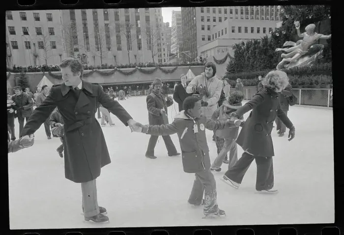 Framed Print : Edward M. Kennedy Helping a Child Skate Framed Print : Edward M. Kennedy Helping a Child Skate