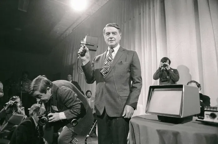Framed Print : Edwin Land Holding Movie Camera Framed Print : Edwin Land Holding Movie Camera