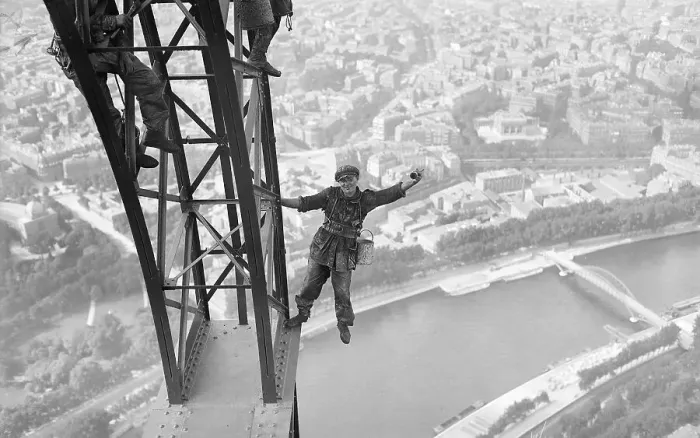 Framed Print : Eiffel Tower Painter Makes Risky Pose Framed Print : Eiffel Tower Painter Makes Risky Pose