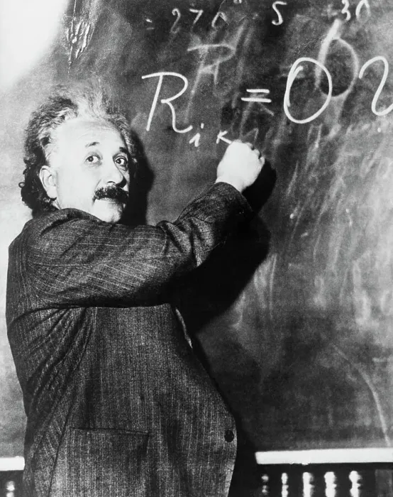 Framed Print : Einstein Writing Equation on Blackboard Framed Print : Einstein Writing Equation on Blackboard