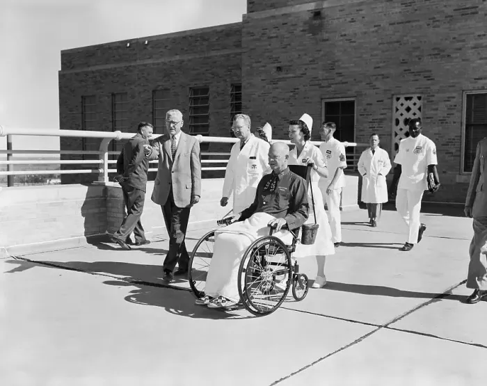Framed Print : Eisenhower in Wheelchair with Press