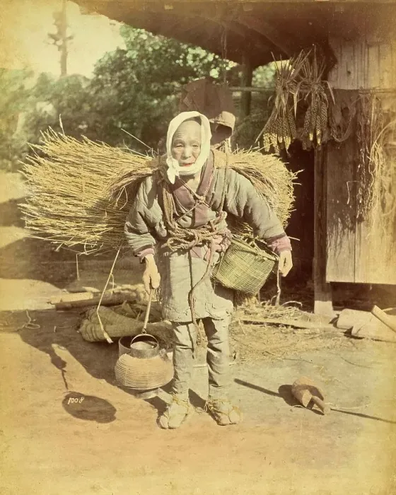 Framed Print : Elderly Japanese woman, farm labourer, carrying bales of straw on her back, work, c. 1870, Japan, Historic, digitally restored reproduction from an original of the period Framed Print : Elderly Japanese woman, farm labourer, carrying bales of straw on her back, work, c. 1870, Japan, Historic, digitally restored reproduction from an original of the period