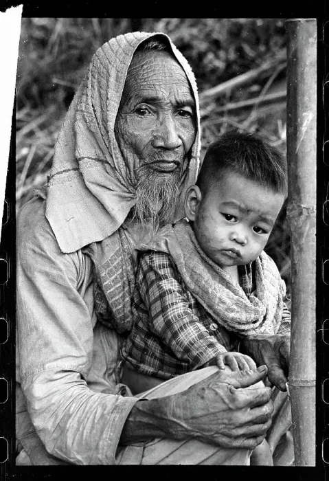 Framed Print : Elderly Man and Boy in War-Torn Vietnam Framed Print : Elderly Man and Boy in War-Torn Vietnam