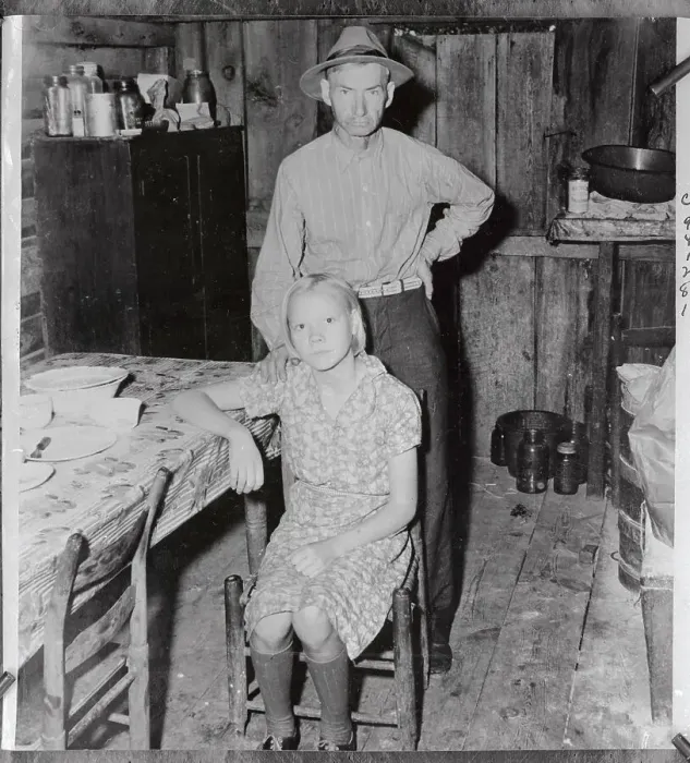 Framed Print : Elderly Man Standing by His Young Wife Framed Print : Elderly Man Standing by His Young Wife