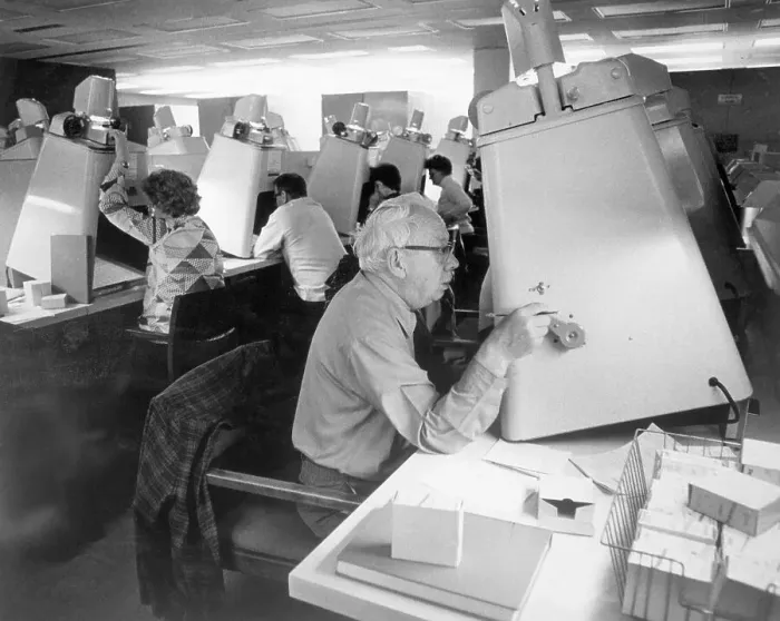 Framed Print : Elderly Man Using Microfilm Machine Framed Print : Elderly Man Using Microfilm Machine