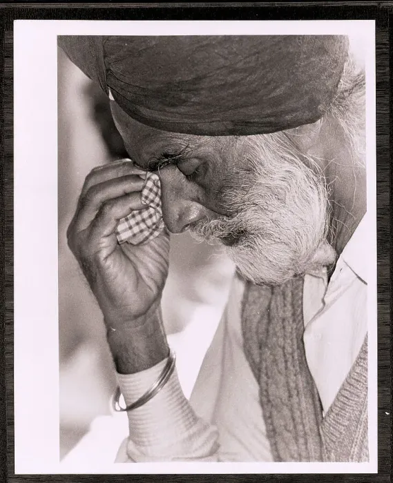 Framed Print : Elderly Sikh Man Wipes Tears from Eyes Framed Print : Elderly Sikh Man Wipes Tears from Eyes