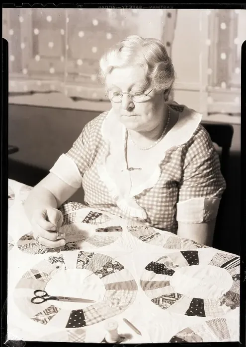 Framed Print : Elderly Woman Making Quilt Framed Print : Elderly Woman Making Quilt