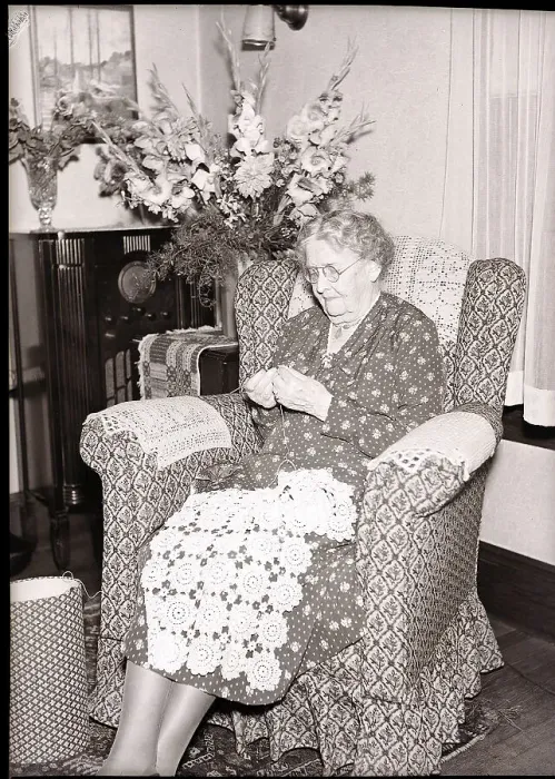 Framed Print : Elderly Woman Seated Doing Needlework Framed Print : Elderly Woman Seated Doing Needlework