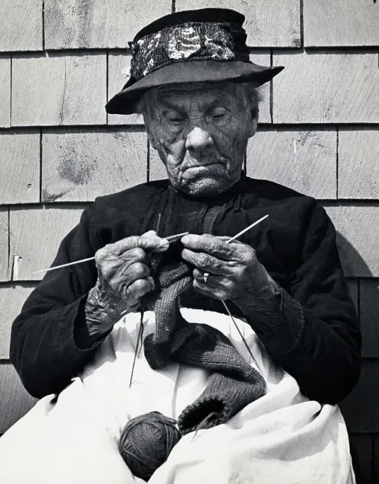 Framed Print : Elderly Woman Seated Knitting