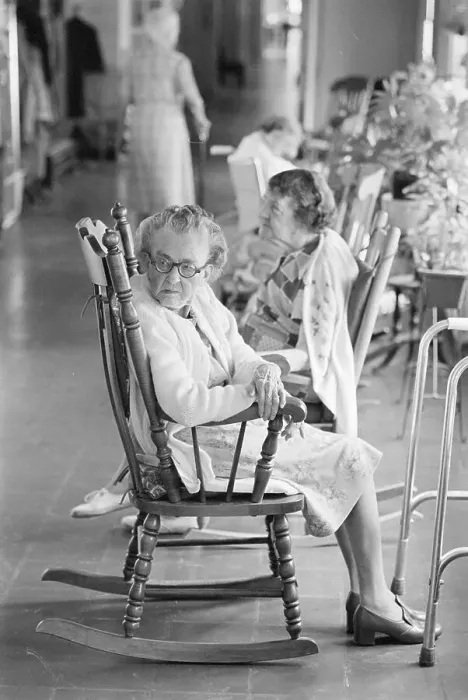 Framed Print : Elderly Woman Sitting In Rocking Chair Framed Print : Elderly Woman Sitting In Rocking Chair