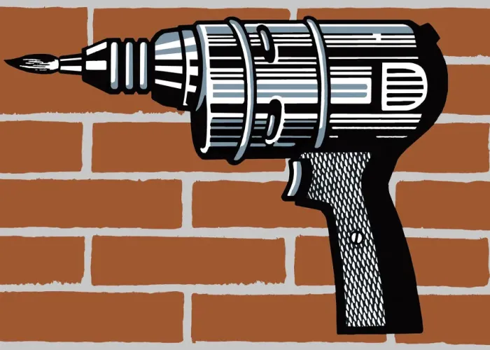 Framed Print : Electric Drill in Front of Brick Wall Framed Print : Electric Drill in Front of Brick Wall