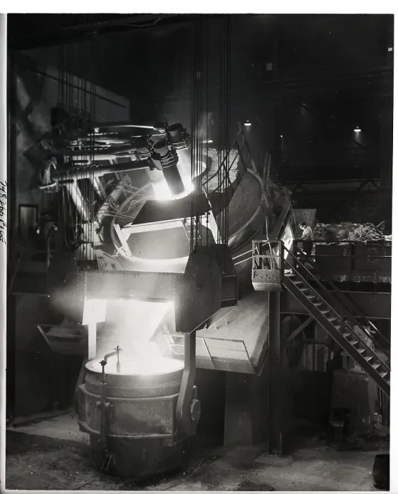 Framed Print : Electric Furnace Tilts To Pour Contents Framed Print : Electric Furnace Tilts To Pour Contents