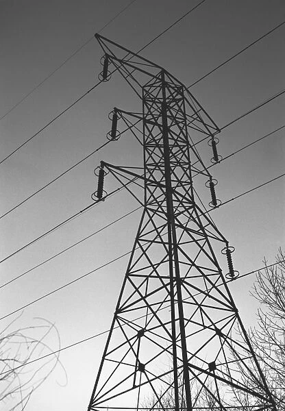 Electricity pylon, (B&W), low angle view
