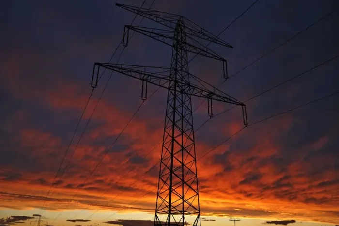 Framed Print : Electricity pylon against a red evening sky, Bavaria, Germany Framed Print : Electricity pylon against a red evening sky, Bavaria, Germany
