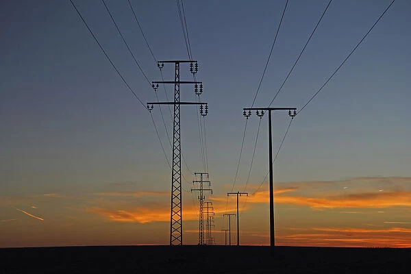 Electricity pylons at sunset, dusk, Upper Swabia, Baden-Wuerttemberg, Germany, Europe